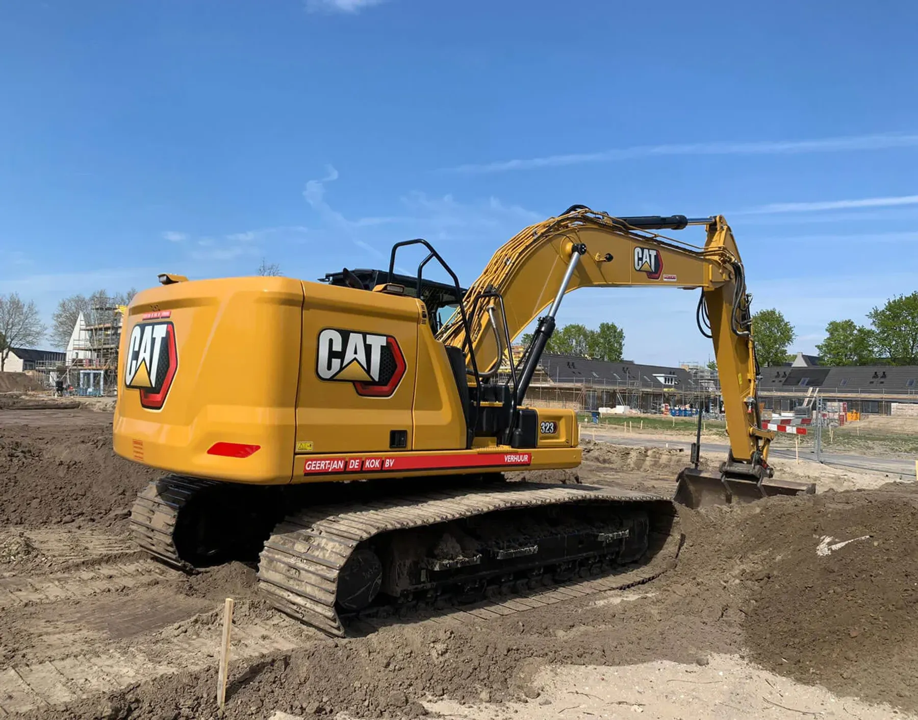 CAT323 Graafmachine Cover
